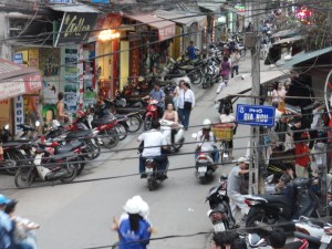 A view of the street from a second floor restaurant. It doesn't come close to showing the true craziness, though.
