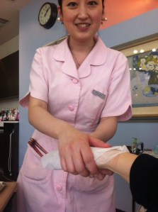 The incredible Aiko-san, massaging my right hand while I clumsily take a bad picture with my left. She is more beautiful in person.