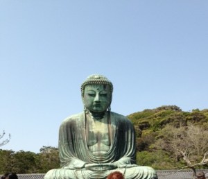 The Daibutsu Buddha set against the hillside backdrop